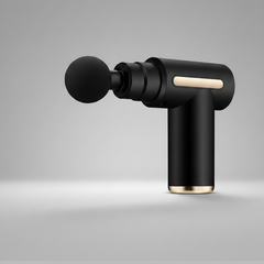 Black massage gun with attachments on a dark background