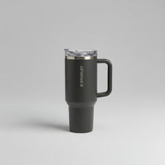 dark graycolored travel mug with handle on a gray background