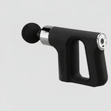 Multifunctional fascia gun with attachments on a white background
