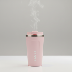 pink coffee tumblers with steam rising from the black one on a wooden surface.